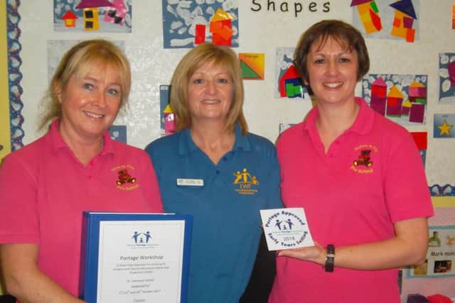 Sue Goodhand and Corrina Smaller , (above)received the award from Ann Ordish the Senior Portage Worker based at Lincs Wolds Federation Community Trust Louth.