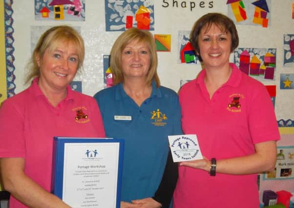 Sue Goodhand and Corrina Smaller , (above)received the award from Ann Ordish the Senior Portage Worker based at Lincs Wolds Federation Community Trust Louth.