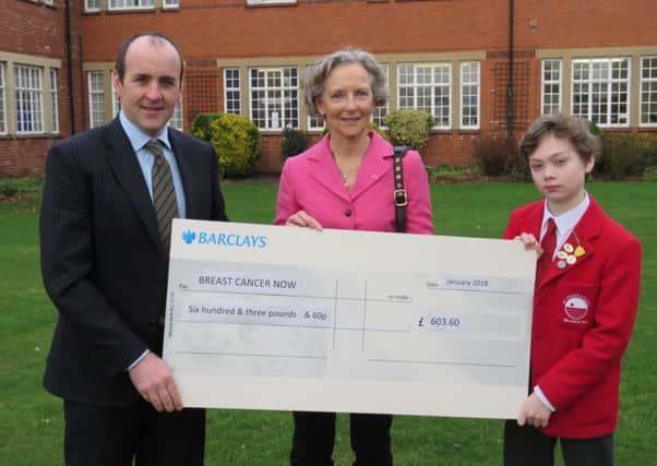 St Hugh's has presented Â£603.60 to the charity Breast Cancer Now. EMN-180130-125403001