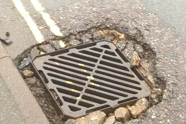 The damaged drain and gulley - it will be repaired says councillor.