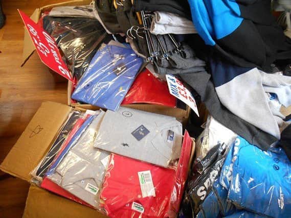 A market trader in Ingoldmells has been fined more than Â£1,419 after admitting to possesing over 1,000 counterfeit items. ANL-180102-130525001