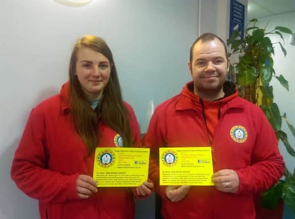 Canine Funbarn: Tony Bryson with one of his employees, Lizzie Quinlan.