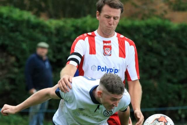 Wongers skipper Chris Johnson in action against Borough earlier this season.