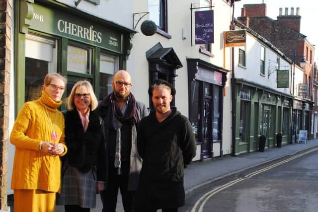 Pride of Boston and proud of Pen Street, from left Ruth Quinnell of Ruthie Qs lingerie shop, Gill Burns of Cherry Tree Shoes, Jason Brackenbury of Isaacs Furniture Store, and Philip Scarborough of Philip George Hair. EMN-180802-114013001