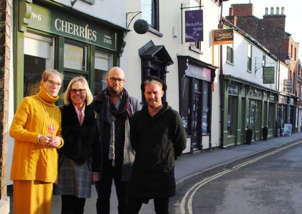 Pride of Boston and proud of Pen Street, from left Ruth Quinnell of Ruthie Qs lingerie shop, Gill Burns of Cherry Tree Shoes, Jason Brackenbury of Isaacs Furniture Store, and Philip Scarborough of Philip George Hair. EMN-180802-114013001