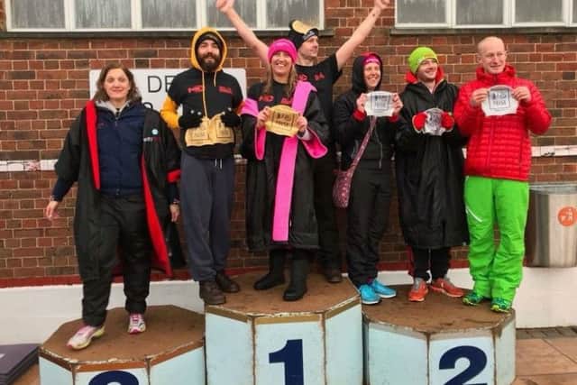 Louth's team of swimmers and triathletes warm up after taking the icy plunge in London EMN-180502-134032002