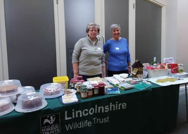 Branch members Sue Oliver, left, and Stef Round man a staff at the coffee morning event in Spilsby.