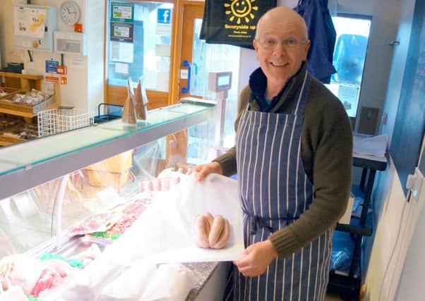Butcher Nick Bradley has gone back in time to wrap meat items in paper rather than plastic EMN-180802-140117001
