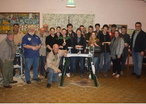 Lincolnshire Wolds Woodturning Association opened its doors for a
special 'Hands On' night inviting Coningsby Young Farmers club
members to go along and have a go at woodturning. EMN-181202-070625001