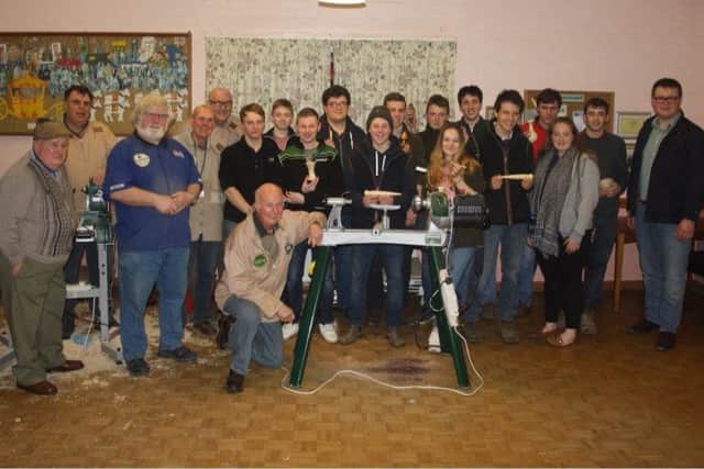 Lincolnshire Wolds Woodturning Association opened its doors for a
special 'Hands On' night inviting Coningsby Young Farmers club
members to go along and have a go at woodturning. EMN-181202-070625001