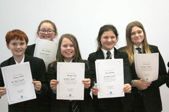 Year 7s: Tom Brack, Ashleigh Day and Year 8s: Alicia Meredith, Lara Lynes and , Anna Mottram EMN-181102-223313001