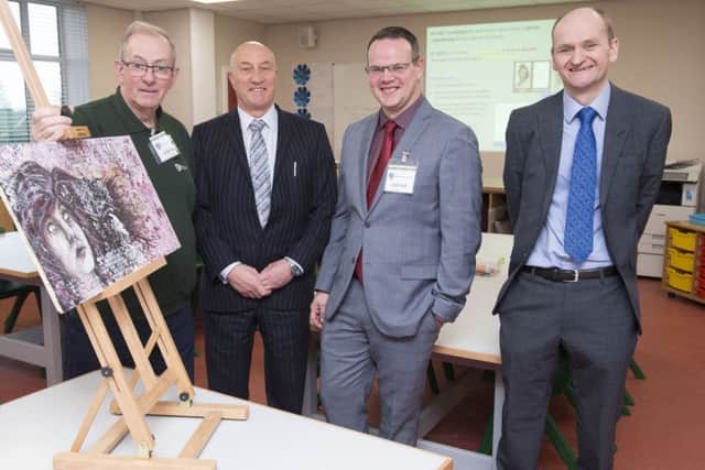 Louth Town Councillors Francis Treanor (left) and Darren Hobson (third left) pictured with) David Hampson, Tollbar MAT chief executive and Martin Brown (right), Louth Academy executive principal.