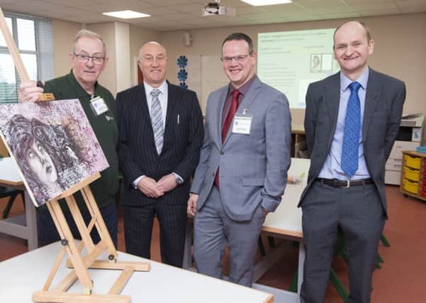 Louth Town Councillors Francis Treanor (left) and Darren Hobson (third left) pictured with) David Hampson, Tollbar MAT chief executive and Martin Brown (right), Louth Academy executive principal.