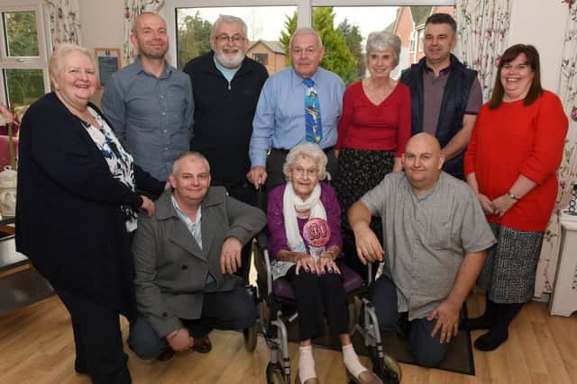 Rose Whitaker, of Elmwood House Nursing Home, Boston, celebrating her 100th birthday. Pictured (front from left) Simon Sharp - grandson, Rose Whitaker, Jerome Sharp - grandson. (back from left) Susan Sharp - daughter-in-law, Duane Sharp - grandson, Andrew Sharp - son, Richard Sharp - son, Sheila Sharp - daughter-in-law, Darren Sharp - grandson, and Melanie Sharp - grand daughter.