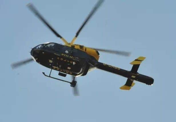 The police helicopter was dispatched to help pursue a suspect EMN-180902-170730001