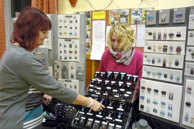 Dayl Jones, right, with her polymer jewellery at Binbrook & District WI EMN-180214-094428001