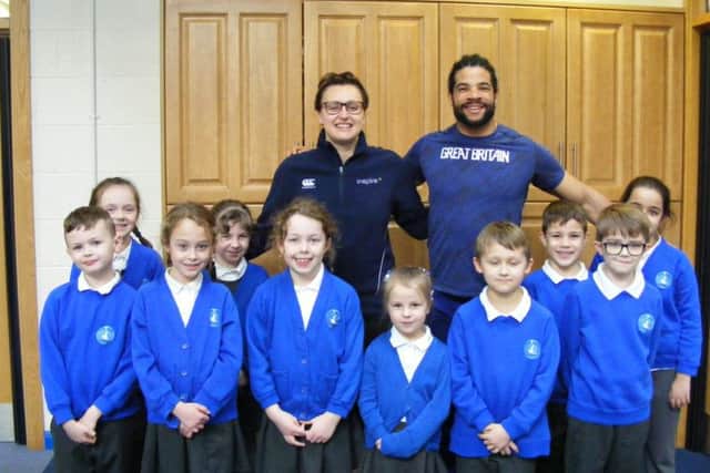 Sports mentors Sophie Allen and Sam Ruddock with pupils at St Botolphs School, Quarrington. EMN-180219-182733001