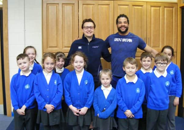 Sports mentors Sophie Allen and Sam Ruddock with pupils at St Botolphs School, Quarrington. EMN-180219-182733001