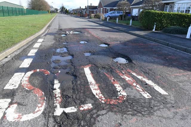 Potholes in and around Boston. Fernleigh Way, Boston. EMN-181202-095254001