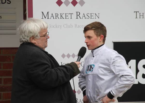 Racecourse presenter Mike Vince interviews rising star James Bowen after his feature race win EMN-181202-105744002