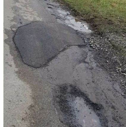 Potholes in Firsby. ANL-181202-132355001