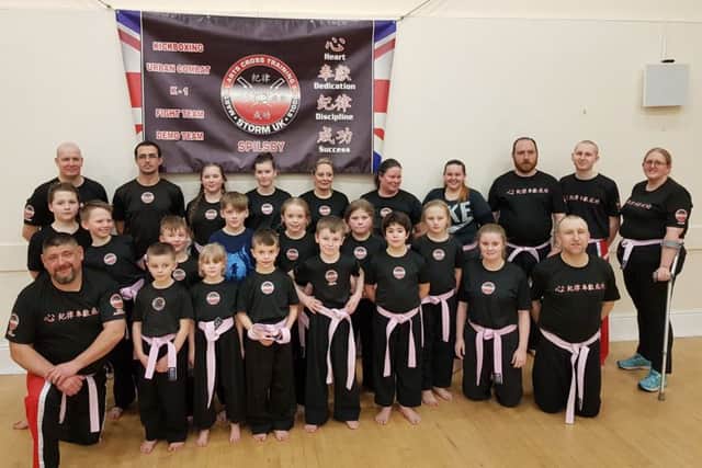 Storm Uk Spilsby bought and wore special pink belts to raise funds for Cancer Research UK