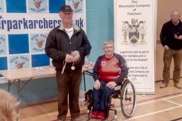 Experienced archer Peter Shaw receives his medal EMN-181202-162636002