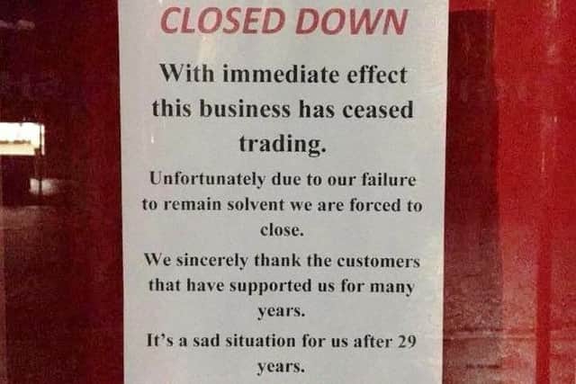 The sign displayed in the window on Friday last week.