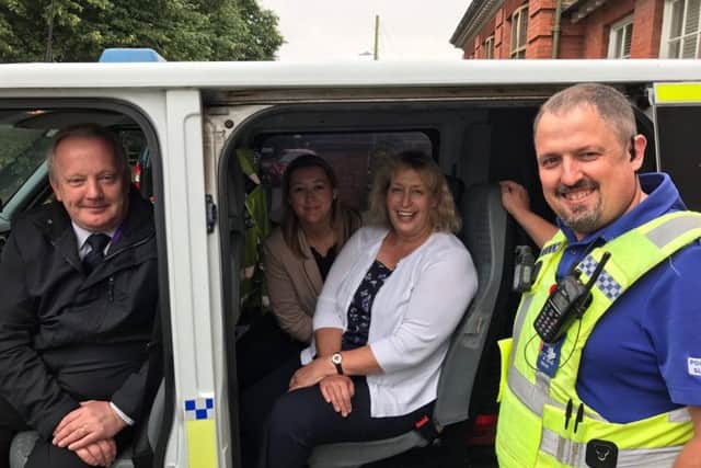 Deputy PCC Stuart Tweedale with PCSO Nigel Wass and two officials from Trading Standards.