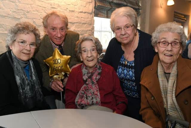 Anne Underwood celebrating her 100th birthday. Pictured with children (from left) Shirley Allen, Tony Hanson, Jackie Walton, and Ivy Buckley.
