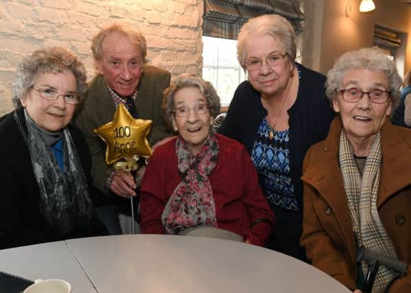 Anne Underwood celebrating her 100th birthday. Pictured with children (from left) Shirley Allen, Tony Hanson, Jackie Walton, and Ivy Buckley.