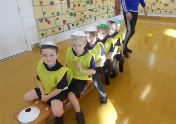 Putting a cone marker on your head formed part of the 'bobsleigh bench' challenge.