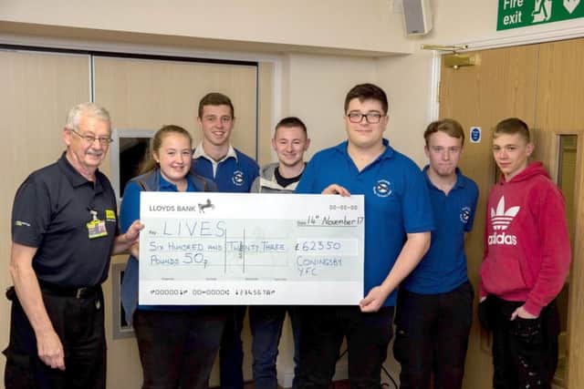 Coningsby Young Farmers have shared the proceeds of their Chicken Race Night with LIVES EMN-180214-091359001