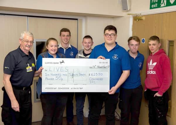 Coningsby Young Farmers have shared the proceeds of their Chicken Race Night with LIVES EMN-180214-091359001