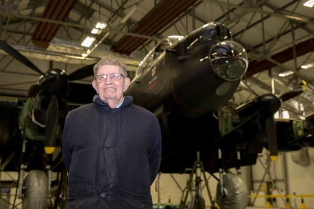 Bill Evans-Evans in front of the Lancaster of The Battle of Britain Memorial Flight. Picture: SAC Mayfield. EMN-180214-145704001