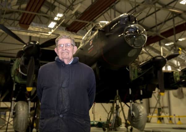 Bill Evans-Evans in front of the Lancaster of The Battle of Britain Memorial Flight. Picture: SAC Mayfield. EMN-180214-145704001