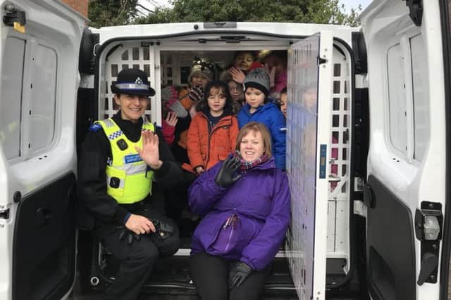 PCSO Teresa Key with staff and children from Wellies Nursery.