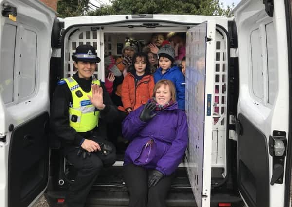 PCSO Teresa Key with staff and children from Wellies Nursery.