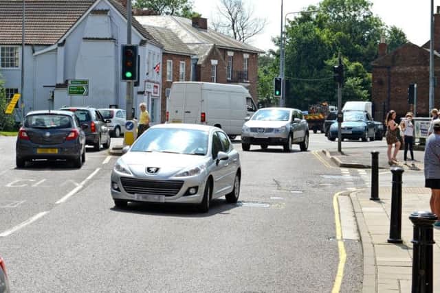 Could altering the sequence of the traffic lights solve town's traffic nightmare? Picture: Bull Ring traffic, Horncastle.
