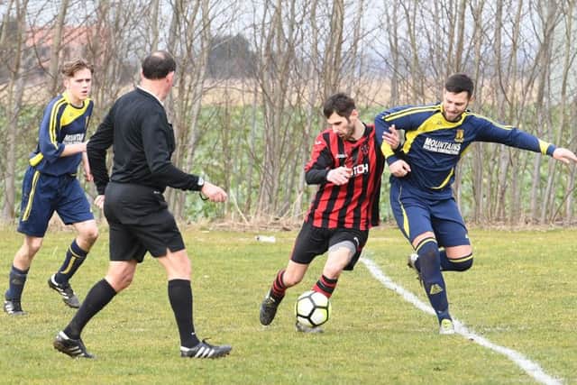 Park Utd (blue) v Woodhall (red). Dan Huskisson (blue), Sam Brader (red).