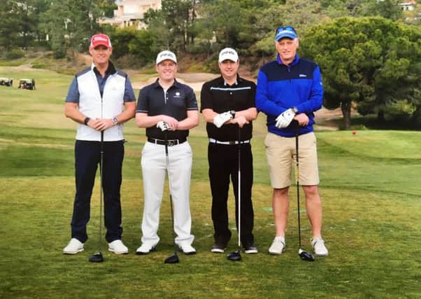 Coupland, second left, and his team on the Algarve.