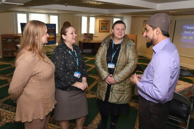 Community Day at Boston Mosque. L-R Christine Bossley, Elena O'Callaghan, Anna Kusztyb, Arif Mateen. EMN-180220-102252001