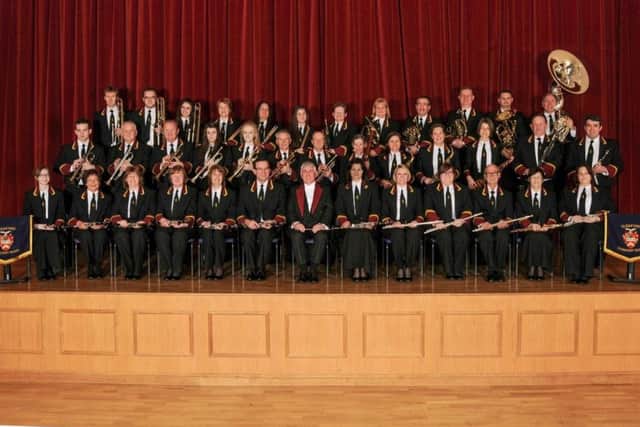 An image of Sleaford Concert Band with Jim McQuade (centre). EMN-180226-102619001