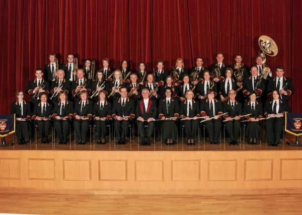 An image of Sleaford Concert Band with Jim McQuade (centre). EMN-180226-102619001