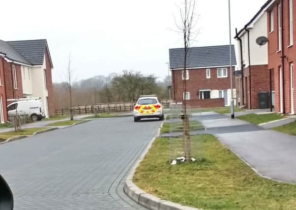 Police car in the area in Steve Newton Avenue this morning (Wednesday).