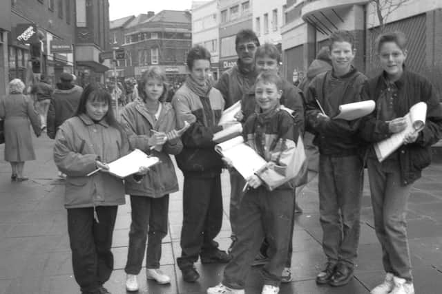Haven High School pupils gather information in a CCTV survey in Boston in 1993.