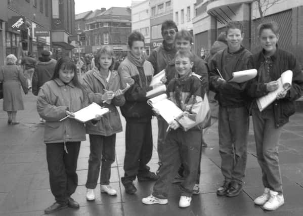 Haven High School pupils gather information in a CCTV survey in Boston in 1993.