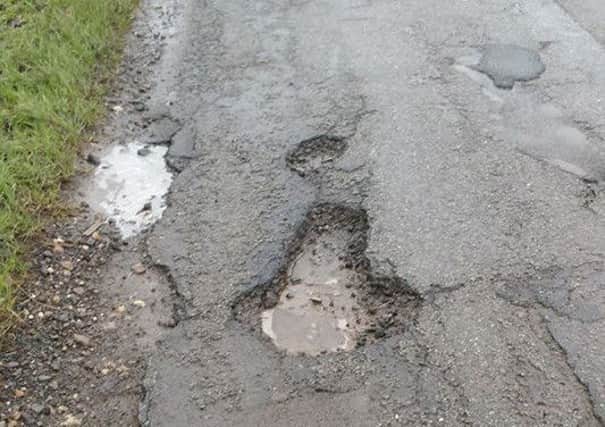 Waiting to be mended: A pothole on a back road in the Woodhall Spa area.