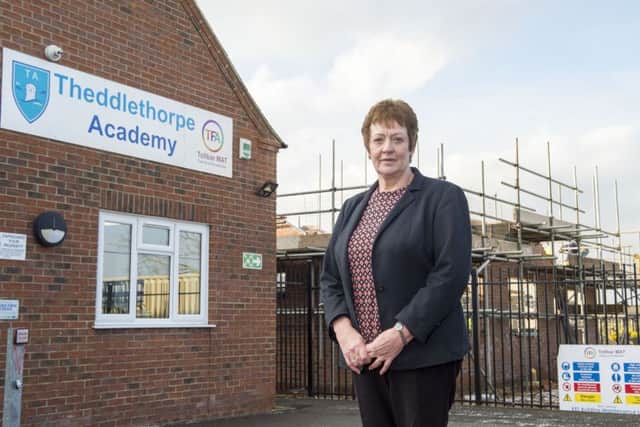 Mandy White, Theddlethorpe Academy Principal, outside the academy with the new nursery block under construction in the background.
