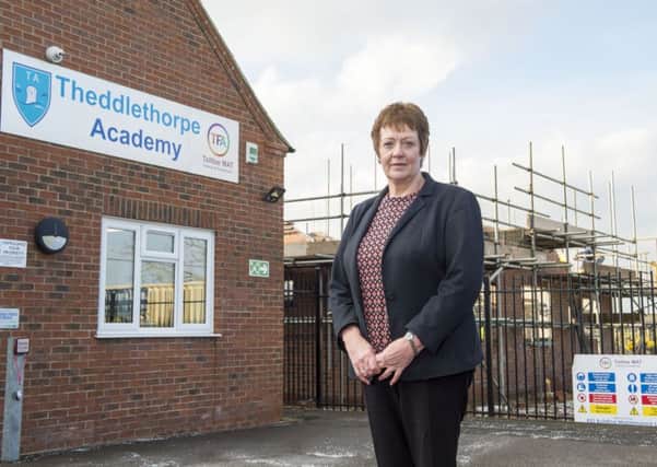 Mandy White, Theddlethorpe Academy Principal, outside the academy with the new nursery block under construction in the background.